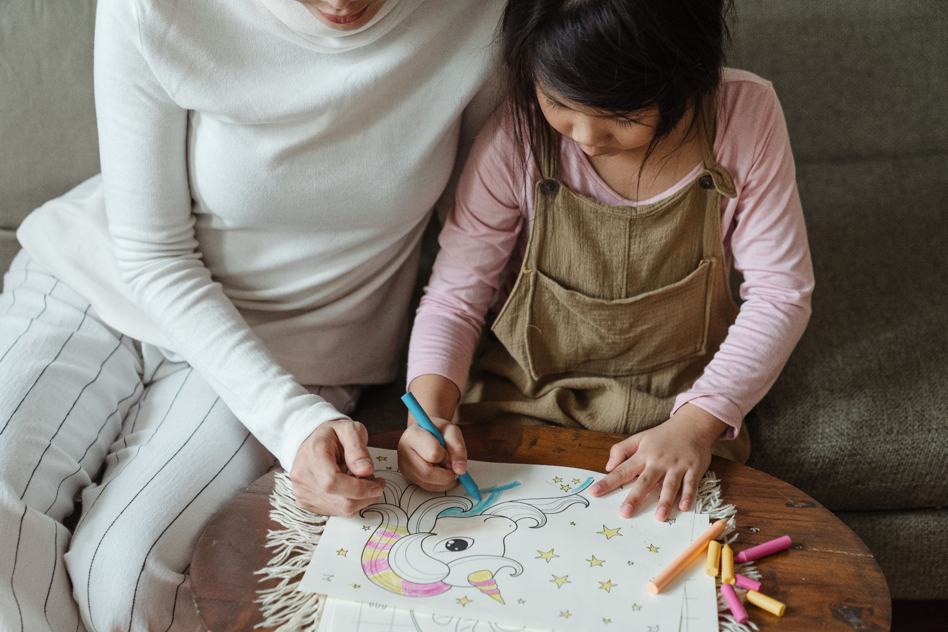 Parent and child drawing together during a Family Time session